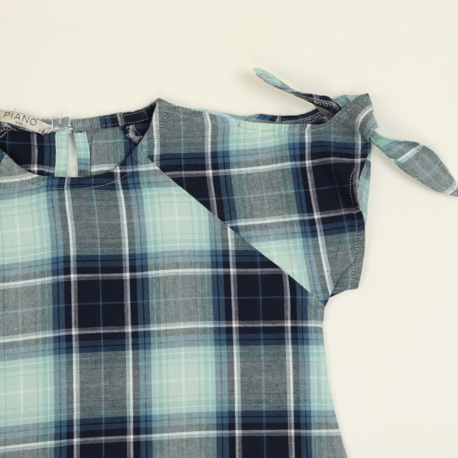 پیراهن نساجی کجراه آستین گره ای